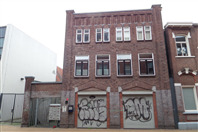Bedrijfspand met woningen, Schuitemakersstraat 9, Groningen