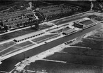 Luchtfoto van het totale complex en het haventerrein.
<br/>
KLM Aerocarto, 1928