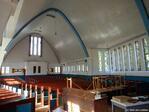 Kerkzaal gezien richting ingang.
              <br/>
              Gert-Jan Lobbes, 2022
