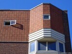 Het bovenste deel van de gevel aan de Krommeniestraat.
<br/>
Gert-Jan Lobbes, 2020