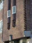 Detail trappenhuisgevel met cilindervormige uitbouwtjes.
<br/>
Gert-Jan Lobbes, 2023