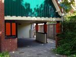 Doorgang naar het schoolplein. Sterk gewijzigde kleuren na restauratie.
<br/>
Gert-Jan Lobbes, 2020