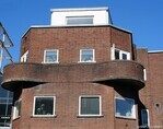 Het perceel aan de Gedempte Singel had oorspronkelijk een bakstenen opbouw.
<br/>
Gert-Jan Lobbes, 2021