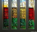 Onderzijde glas-in-lood raam met diverse bloemen.
<br/>
Gert-Jan Lobbes, 2022