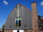 Top van de westgevel.
              <br/>
              Gert-Jan Lobbes, 2024