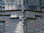 Bakstenen versiering op de overgang van tweede naar derde verdieping.
<br/>
Gert-Jan Lobbes, 2023