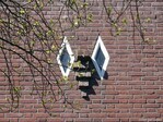 Zolderraampjes van de trappenhuisgevel.
<br/>
Gert-Jan Lobbes, 2020