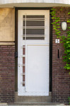 Een van de drie voordeuren.
<br/>
Marcel Westhoff, 2023