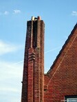 Statige schoorsteen met expressief metselwerk.
<br/>
Gert-Jan Lobbes, 2025