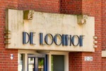 Boven de entree.
<br/>
Marcel Westhoff, 2023