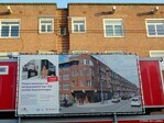 Het bord van Ymere.
              <br/>
              Gert-Jan Lobbes, 2024