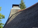 Glooiend dak en schoorsteen.
              <br/>
              Gert-Jan Lobbes, 2020