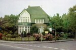 Historische foto met de bakstenen gevel nog intact.
<br/>
Dossier eigenaren, 1971