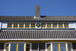 Kleurrijk houtwerk met versiering.
<br/>
Roel Siebrand, 2021