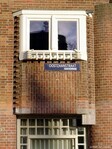 Hoekkozijn met gereconstrueerde plantenbakhouder.
<br/>
Gert-Jan Lobbes, december 2023