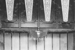 Een smeedijzeren en koperen lamp in de vorm van een uil.
<br/>
Detail foto 1, omstreeks 1920