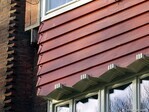 Het houten deel van de gevel, detail.
<br/>
Gert-Jan Lobbes, 2023
