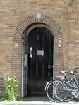 De voordeur in een fraaie gemetselde boog (Schalkwijkerstraat).
<br/>
Gert-Jan Lobbes, 2026