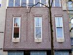 De zijgevel, na 'renovatie' met platvolle voeg.
<br/>
Gert-Jan Lobbes, 2022