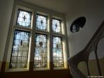 Trappenhuis met zes glas-in-lood ramen van Corns van Straaten.
<br/>
Gert-Jan Lobbes, 2023