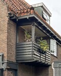 Fraaie houten balkon.
<br/>
Roel Siebrand, 2026