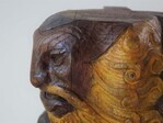 Mannenhoofd met baard.
              <br/>
              Studio Eklektik, 2024