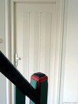 Trappaal en toegangsdeur woning.
<br/>
Gert-Jan Lobbes, 2023